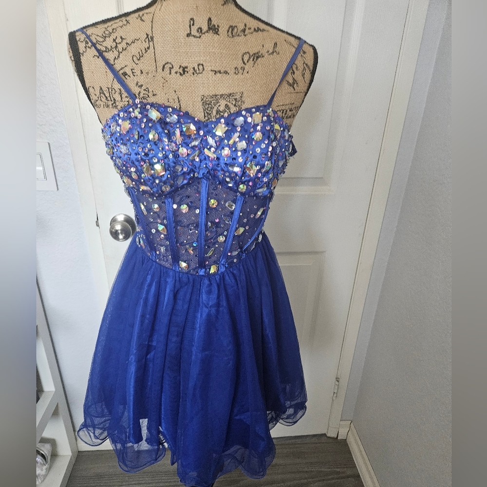 Blondie nites blue strapless beaded corset dress.